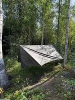 Winter tarp pitched with open ends and a clear view